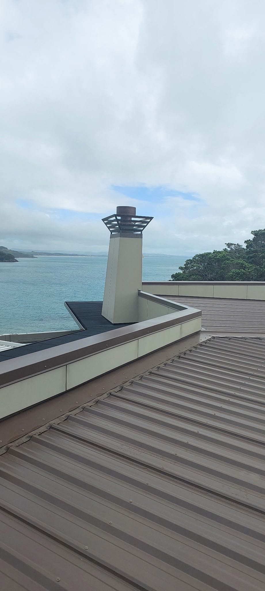 Roof surface being cleaned or treated